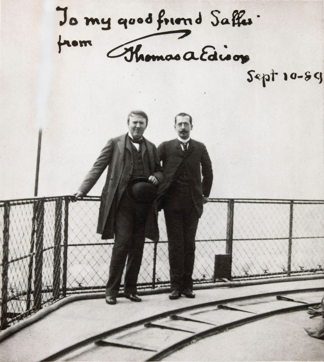 Thomas Edison with Monsieur Salles atop the Eiffel Tower Réunion des Musées Nationaux